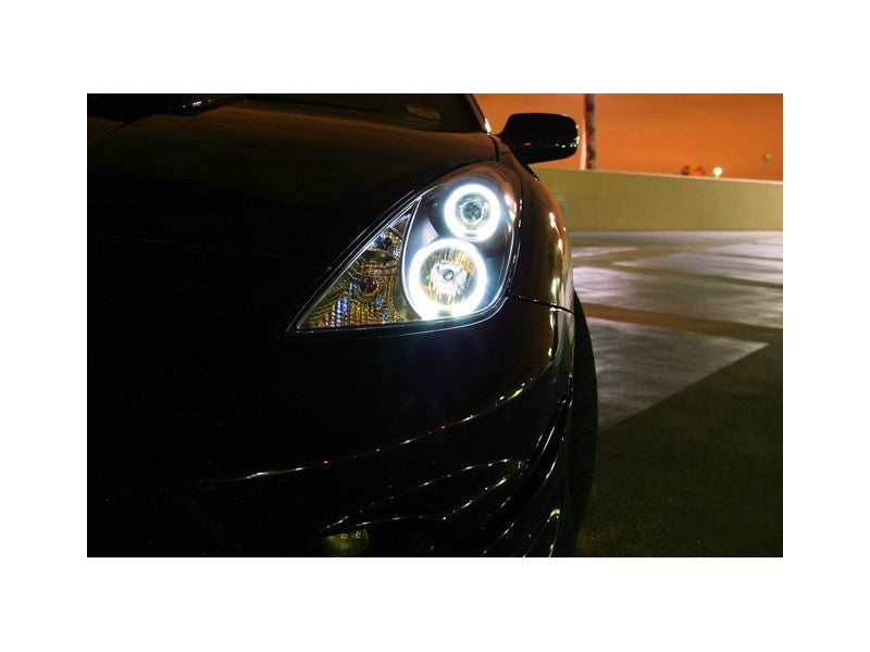 Spyder Toyota Celica 00-05 Projector Headlights LED Halo DRL Blk